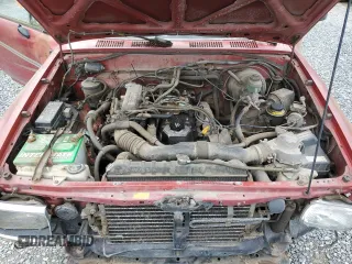 1992 Toyota Pickup DLX z VIN JT4RN93P4N5064218, wystawiony jako Copart lot #58095635 z przebiegiem 256 271 mil mil oraz Tytuł czysty. Historia ofert i sprzedaży dostępna na DreamBid. Obrazek 12.