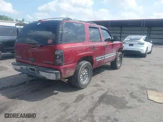 2002 Chevrolet Tahoe LT with VIN 1GNEC13ZX2R326813, listed as a IAAI auction lot 41918241 with 278,409 mi miles. Bid and sale history available at carsss.com. Image 4.