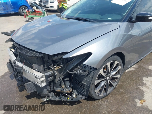 2016 Nissan Maxima SL with VIN 1N4AA6AP7GC395308, listed as a IAAI auction lot 42187762 with 154,171 mi miles and . Bid and sale history available at DreamBid. Image 18.