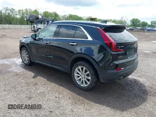 2019 Cadillac XT4 AWD Luxury z VIN 1GYFZBR41KF150209, wystawiony jako IAAI lot #42325529 z przebiegiem 76 828 mil mil oraz . Historia ofert i sprzedaży dostępna na DreamBid. Obrazek 3.