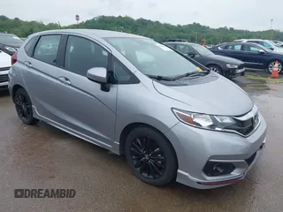 2020 Honda Fit Sport z VIN 3HGGK5H63LM731359, wystawiony jako IAAI lot #42145926 z przebiegiem 40 353 mil mil oraz . Historia ofert i sprzedaży dostępna na DreamBid. Obrazek 1.