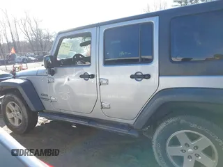2015 Jeep Wrangler Unlimited Sport with VIN 1C4BJWDG4FL732123, listed as a IAAI auction lot 41864714 with 142,382 mi miles. Bid and sale history available at carsss.com. Image 14.
