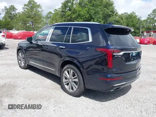 2022 Cadillac XT6 Premium Luxury with VIN 1GYKPCRS4NZ145145, listed as a IAAI auction lot 42533642 with 36,450 mi miles and . Bid and sale history available at DreamBid. Image 3.