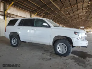 2019 Chevrolet Tahoe Commercial with VIN 1GNSKFEC4KR128319, listed as a Copart auction lot 83878674 with 129,751 mi miles and Clean Title. Bid and sale history available at carsss.com. Image 4.