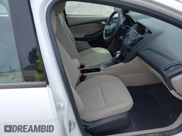 2016 Ford Focus SE with VIN 1FADP3F21GL403121, listed as a IAAI auction lot 42130743 with 103,592 mi miles and . Bid and sale history available at DreamBid. Image 5.