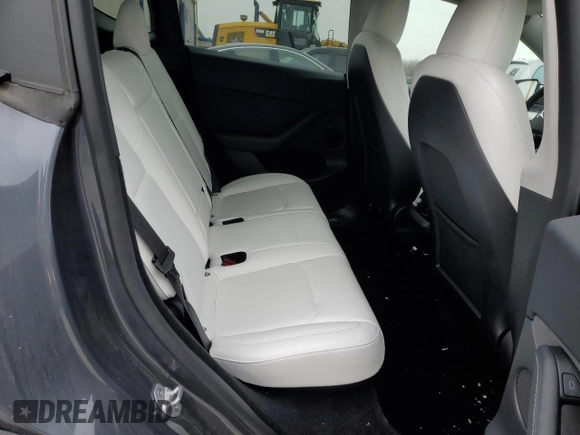 2023 Tesla Model Y Long Range z VIN 7SAYGDEE8PF884567, wystawiony jako Copart lot #45181465 z przebiegiem 16 653 mil mil oraz Szkoda całkowita • Salvage title. Historia ofert i sprzedaży dostępna na DreamBid. Obrazek 10.