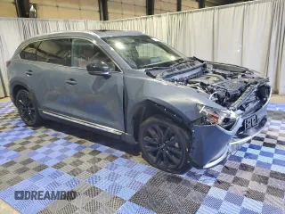 2023 Mazda CX-9 Carbon Edition z VIN JM3TCBDY0P0645880, wystawiony jako Copart lot #81275354 z przebiegiem 16 781 mil mil oraz Szkoda całkowita • Salvage title. Historia ofert i sprzedaży dostępna na DreamBid. Obrazek 4.