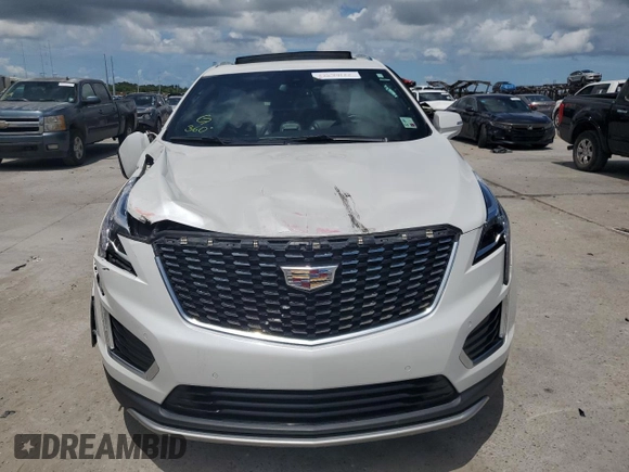 2021 Cadillac XT5 FWD Premium Luxury z VIN 1GYKNCR44MZ106982, wystawiony jako Copart lot #62234455 z przebiegiem 93 079 mil mil oraz Szkoda całkowita • Salvage title. Historia ofert i sprzedaży dostępna na DreamBid. Obrazek 5.