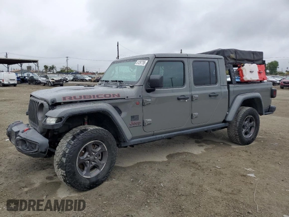 2021 Jeep Gladiator Rubicon with VIN 1C6JJTBG5ML615653, listed as a Copart auction lot 51297795 with 48,918 mi miles and Salvage title. Bid and sale history available at DreamBid. Image 1.