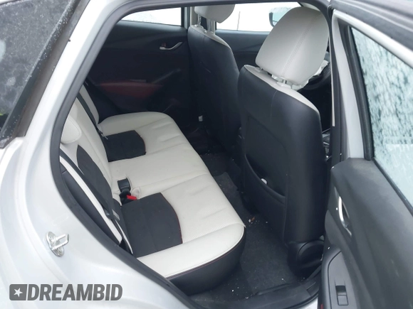 2016 Mazda CX-3 Grand Touring with VIN JM1DKFD7XG0132084, listed as a IAAI auction lot 41004954 with 70,476 mi miles. Bid and sale history available at carsss.com. Image 8.