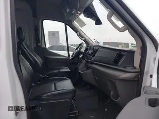 2023 Ford Transit Cargo with VIN 1FTBR1C84PKA65079, listed as a IAAI auction lot 41423167 with 68,899 mi miles and . Bid and sale history available at DreamBid. Image 5.