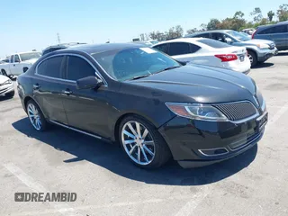 2013 Lincoln MKS z VIN 1LNHL9DK3DG610199, wystawiony jako IAAI lot #42213896 z przebiegiem 169 741 mil mil oraz . Historia ofert i sprzedaży dostępna na DreamBid. Obrazek 1.