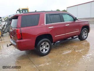 2017 Chevrolet Tahoe LT with VIN 1GNSKBKCXHR270034, listed as a IAAI auction lot 42036132 with 144,530 mi miles. Bid and sale history available at carsss.com. Image 4.