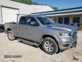 2019 Ram 1500 Laramie with VIN 1C6SRFDT5KN713298, listed as a Copart auction lot 51713624 with 118,908 mi miles and Salvage Title. Bid and sale history available at carsss.com. Image 4.