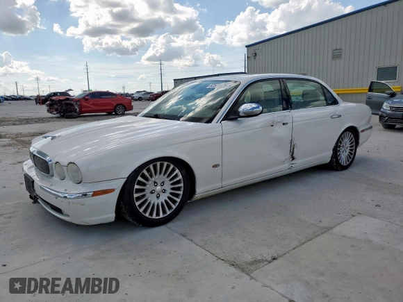 2006 Jaguar XJ Vanden Plas with VIN SAJWA82B16SH06996, listed as a Copart auction lot 62509025 with 80,236 mi miles and Salvage title. Bid and sale history available at DreamBid. Image 1.