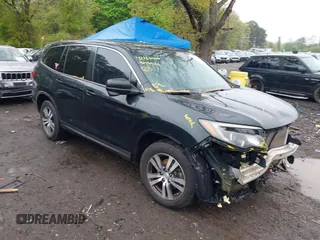 2016 Honda Pilot EX-L z VIN 5FNYF6H56GB127609, wystawiony jako IAAI lot #42186505 z przebiegiem 95 945 mil mil oraz . Historia ofert i sprzedaży dostępna na DreamBid. Obrazek 1.
