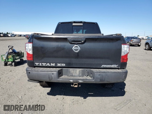 2017 Nissan Titan Pro-4X z VIN 1N6BA1F42HN530830, wystawiony jako Copart lot #63860384 z przebiegiem 317 812 mil mil oraz Szkoda całkowita • Salvage title. Historia ofert i sprzedaży dostępna na DreamBid. Obrazek 6.