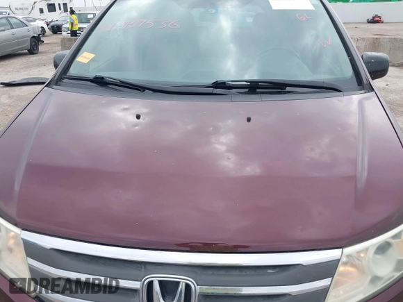2012 Honda Odyssey EX-L with VIN 5FNRL5H61CB108301, listed as a IAAI auction lot 41939536 with 225,476 mi miles and . Bid and sale history available at DreamBid. Image 6.