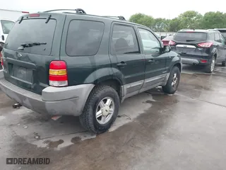 2001 Ford Escape XLT with VIN 1FMCU03101KC25039, listed as a IAAI auction lot 41900122 with 218,126 mi miles. Bid and sale history available at carsss.com. Image 4.