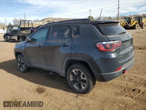 2018 Jeep Compass Trailhawk with VIN 3C4NJDDB9JT337597, listed as a Copart auction lot 86314244 with 88,873 mi miles and Salvage Title. Bid and sale history available at carsss.com. Image 2.