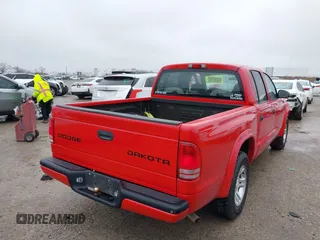 2004 Dodge Dakota Sport with VIN 1D7HL38KX4S657177, listed as a IAAI auction lot 41534575 with 38,802 mi miles. Bid and sale history available at carsss.com. Image 4.