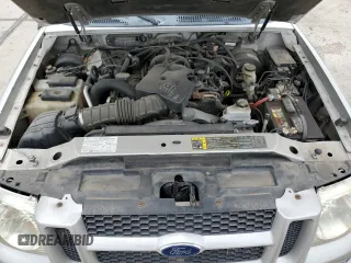 2005 Ford Explorer Sport Trac XLS z VIN 1FMZU77K85UB40868, wystawiony jako Copart lot #59041105 z przebiegiem 213 338 mil mil oraz Szkoda całkowita • Salvage title. Historia ofert i sprzedaży dostępna na DreamBid. Obrazek 11.