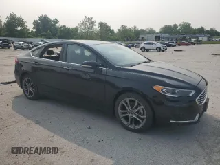 2020 Ford Fusion SEL with VIN 3FA6P0CD0LR178005, listed as a Copart auction lot 59169515 with 66,995 mi miles and Salvage title. Bid and sale history available at DreamBid. Image 4.
