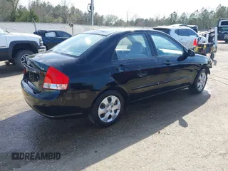 2008 Kia Spectra EX with VIN KNAFE121085549166, listed as a IAAI auction lot 41890354 with 214,401 mi miles. Bid and sale history available at carsss.com. Image 4.