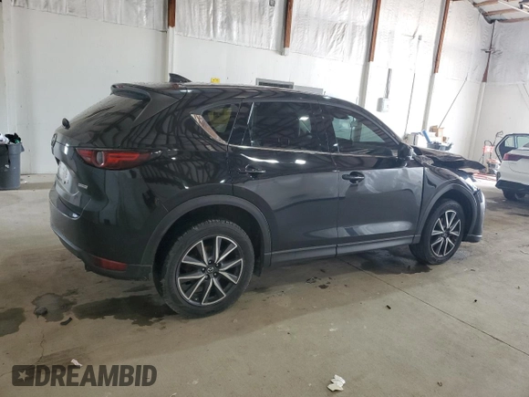 2018 Mazda CX-5 Grand Touring with VIN JM3KFBDM4J0412835, listed as a Copart auction lot 55441315 with 191,968 mi miles and Salvage title. Bid and sale history available at DreamBid. Image 3.