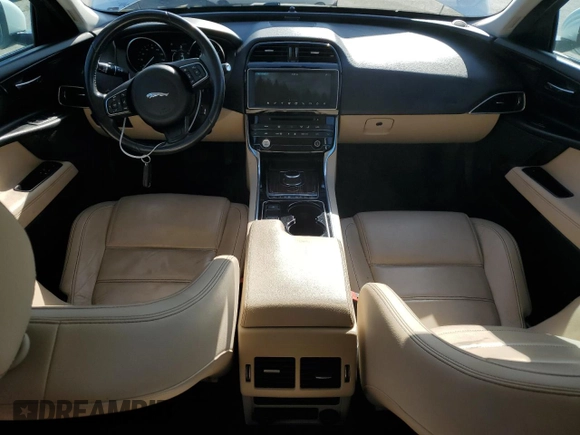 2017 Jaguar XE with VIN SAJAE4BNXHA968653, listed as a Copart auction lot 57039744 with 148,481 mi miles and Salvage Title. Bid and sale history available at DreamBid. Image 8.