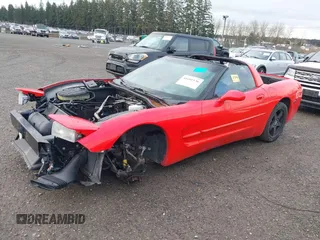 2004 Chevrolet Corvette with VIN 1G1YY22G545121321, listed as a IAAI auction lot 41601136 with 1 mi miles. Bid and sale history available at carsss.com. Image 2.