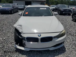 2013 BMW 3 Series 328i с VIN WBA3A5G53DNP24618, выставлен на аукционе Copart как лот 61731845 с пробегом 207 434 миль миль и Списание • Salvage title. История ставок и продаж доступна на DreamBid. Изображение 5.