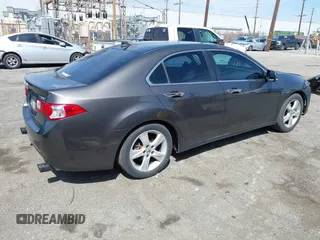 2010 Acura TSX with VIN JH4CU2F67AC038297, listed as a IAAI auction lot 41844587 with 136,741 mi miles and . Bid and sale history available at DreamBid. Image 4.
