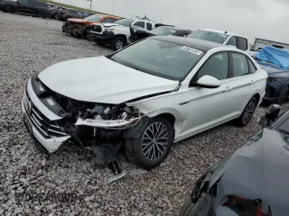 2019 Volkswagen Jetta SEL z VIN 3VWE57BU6KM081373, wystawiony jako Copart lot #54739325 z przebiegiem 65 381 mil mil oraz Czysty tytuł • Clean title. Historia ofert i sprzedaży dostępna na DreamBid. Obrazek 1.