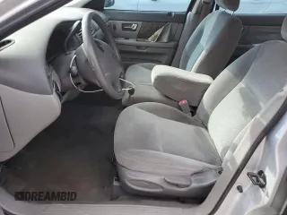 2003 Ford Taurus LX Standard z VIN 1FAFP52U43A110444, wystawiony jako Copart lot #83557764 z przebiegiem 118 897 mil mil oraz Szkoda całkowita • Salvage title. Historia ofert i sprzedaży dostępna na DreamBid. Obrazek 7.