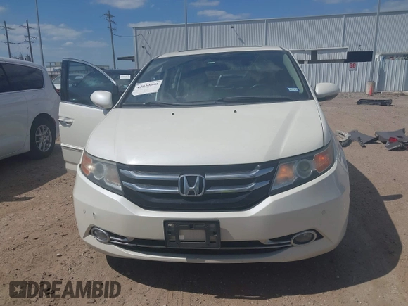 2016 Honda Odyssey Touring Elite with VIN 5FNRL5H98GB102544, listed as a IAAI auction lot 42040050 with 128,957 mi miles and . Bid and sale history available at DreamBid. Image 13.