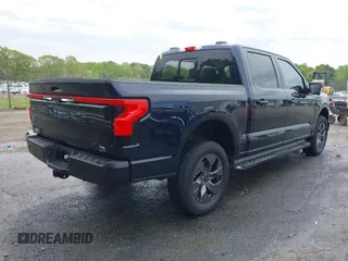 2023 Ford F-150 Lightning Pro with VIN 1FTVW1EL7PWG11924, listed as a IAAI auction lot 41991819 with 20,450 mi miles and . Bid and sale history available at DreamBid. Image 4.