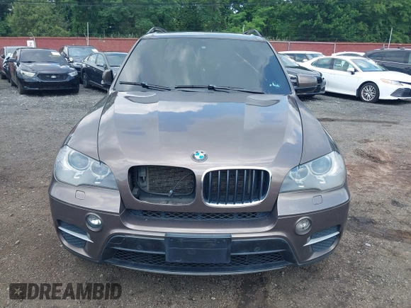 2012 BMW X5 35i with VIN 5UXZV4C59CL766849, listed as a IAAI auction lot 42749836 with 179,273 mi miles and . Bid and sale history available at DreamBid. Image 12.