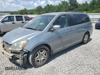 2007 Honda Odyssey EX with VIN 5FNRL38427B005560, listed as a Copart auction lot 62560995 with 200,458 mi miles and Salvage title. Bid and sale history available at DreamBid. Image 1.