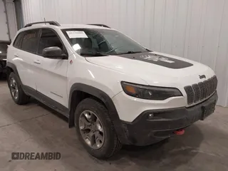 2020 Jeep Cherokee Trailhawk z VIN 1C4PJMBX1LD636503, wystawiony jako IAAI lot #41330008 z przebiegiem 86 146 mil mil oraz . Historia ofert i sprzedaży dostępna na DreamBid. Obrazek 1.