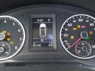 2013 Volkswagen Tiguan S with VIN WVGAV3AX0DW572915, listed as a IAAI auction lot 41937763 with 65,136 mi miles and . Bid and sale history available at DreamBid. Image 15.