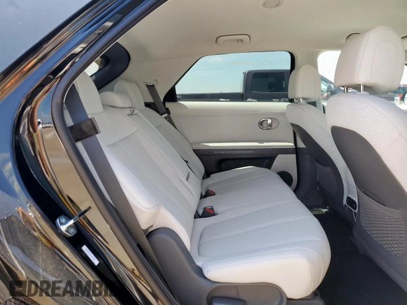 2023 Hyundai Ioniq 5 SEL z VIN KM8KNDAF1PU213459, wystawiony jako Copart lot #58250525 z przebiegiem 19 mil mil oraz Szkoda całkowita • Salvage title. Historia ofert i sprzedaży dostępna na DreamBid. Obrazek 11.