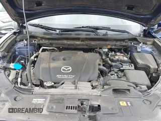2014 Mazda CX-5 Grand Touring with VIN JM3KE2DY1E0307911, listed as a IAAI auction lot 42064898 with 133,934 mi miles. Bid and sale history available at carsss.com. Image 10.