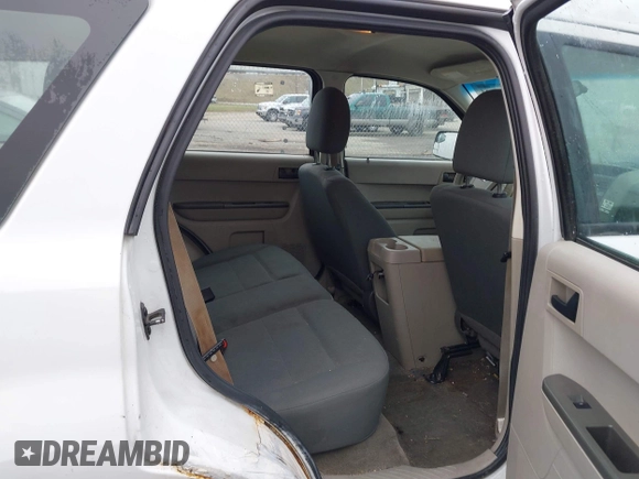 2010 Ford Escape XLS z VIN 1FMCU9C7XAKC89999, wystawiony jako IAAI lot #41506494 z przebiegiem 242 078 mil mil oraz . Historia ofert i sprzedaży dostępna na DreamBid. Obrazek 8.