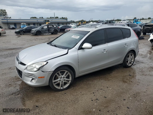 2011 Hyundai Elantra Touring SE with VIN KMHDC8AE4BU117993, listed as a Copart auction lot 79183934 with 108,031 mi miles and Salvage Title. Bid and sale history available at carsss.com. Image 1.
