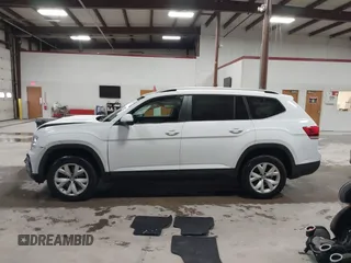2018 Volkswagen Atlas SE with VIN 1V2KR2CA2JC569381, listed as a IAAI auction lot 41843200 with 87,769 mi miles and . Bid and sale history available at DreamBid. Image 14.