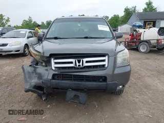 2007 Honda Pilot EX-L z VIN 2HKYF18587H511816, wystawiony jako IAAI lot #42366623 z przebiegiem 170 866 mil mil oraz . Historia ofert i sprzedaży dostępna na DreamBid. Obrazek 12.
