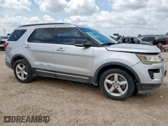 2018 Ford Explorer XLT with VIN 1FM5K7D85JGA54665, listed as a Copart auction lot 61153785 with 59,877 mi miles and Salvage title. Bid and sale history available at DreamBid. Image 4.