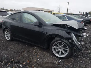 2023 Tesla Model Y Long Range with VIN 7SAYGDEEXPA121625, listed as a IAAI auction lot 41959524 with Not Provided miles and . Bid and sale history available at carsss.com. Image 1.