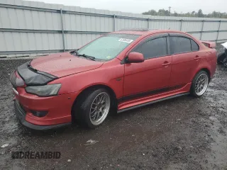 2009 Mitsubishi Lancer GTS with VIN JA3AU86W99U002899, listed as a Copart auction lot 52886455 with 174,184 mi miles and Salvage Title. Bid and sale history available at carsss.com. Image 1.